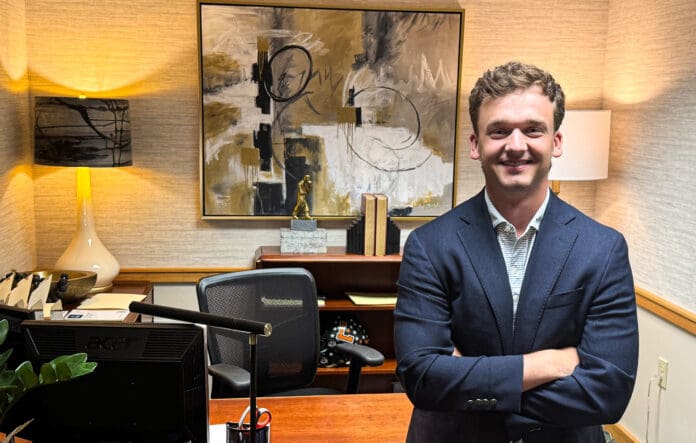 A man in his office.