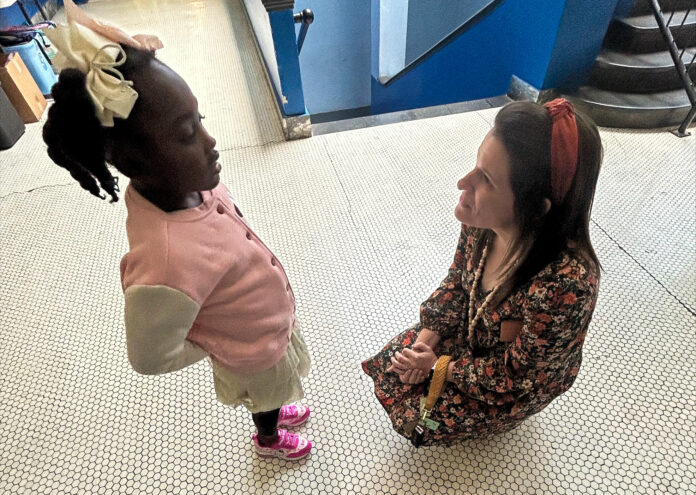 A lady with a child.