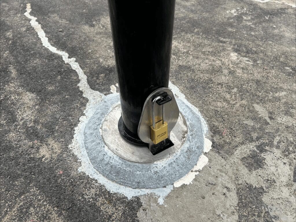 A pole with a lock on it.