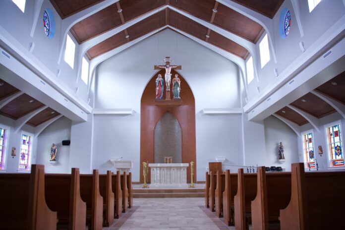 StJohn - Benwood The inside of a church.