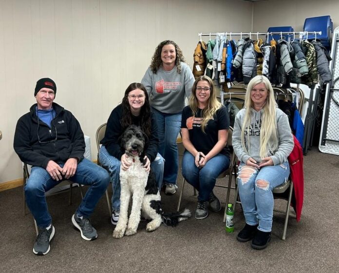 First Choice Realtors Winter Apparel Drive 2025 A group of people.