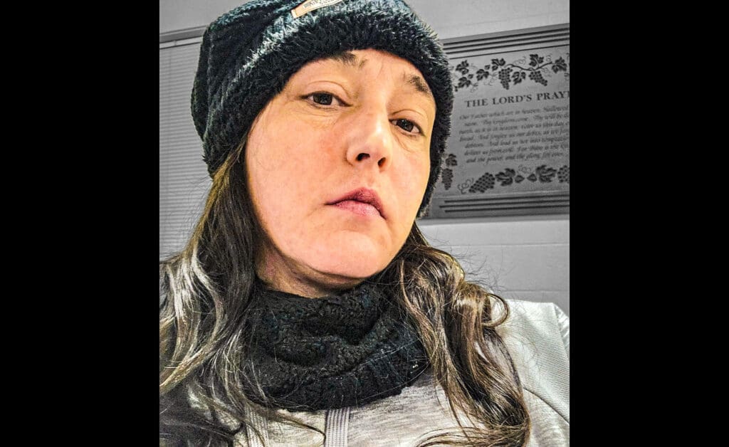 A lady wearing a hat.