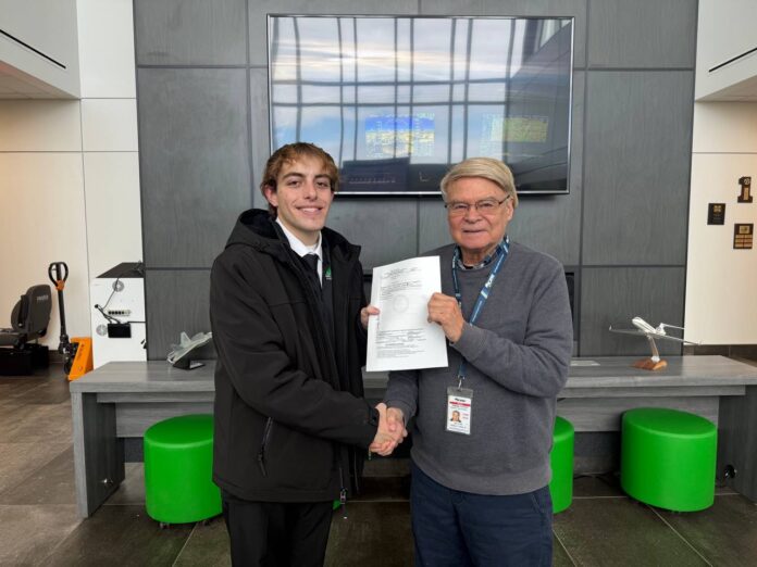 A photo of two people.