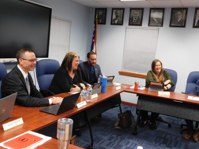 Lansing donation_02 People at a table.