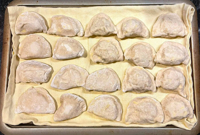 A tray of perogi.