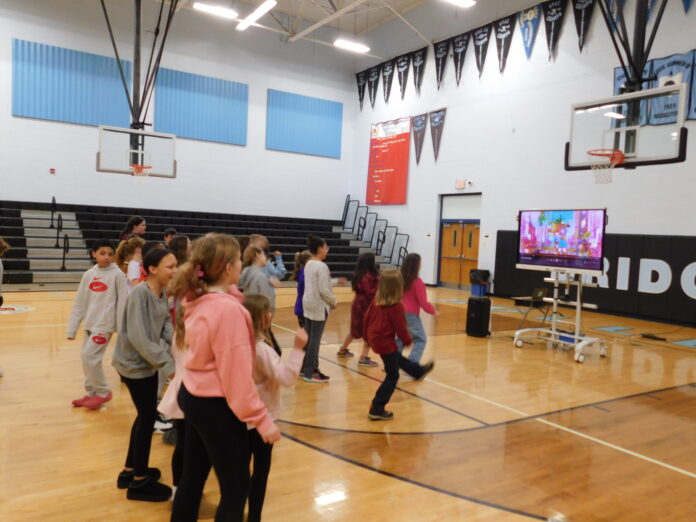 Danceathon_03 People on a basketball court.