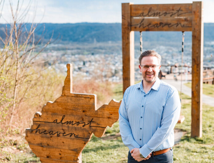 A man on a hilltop.