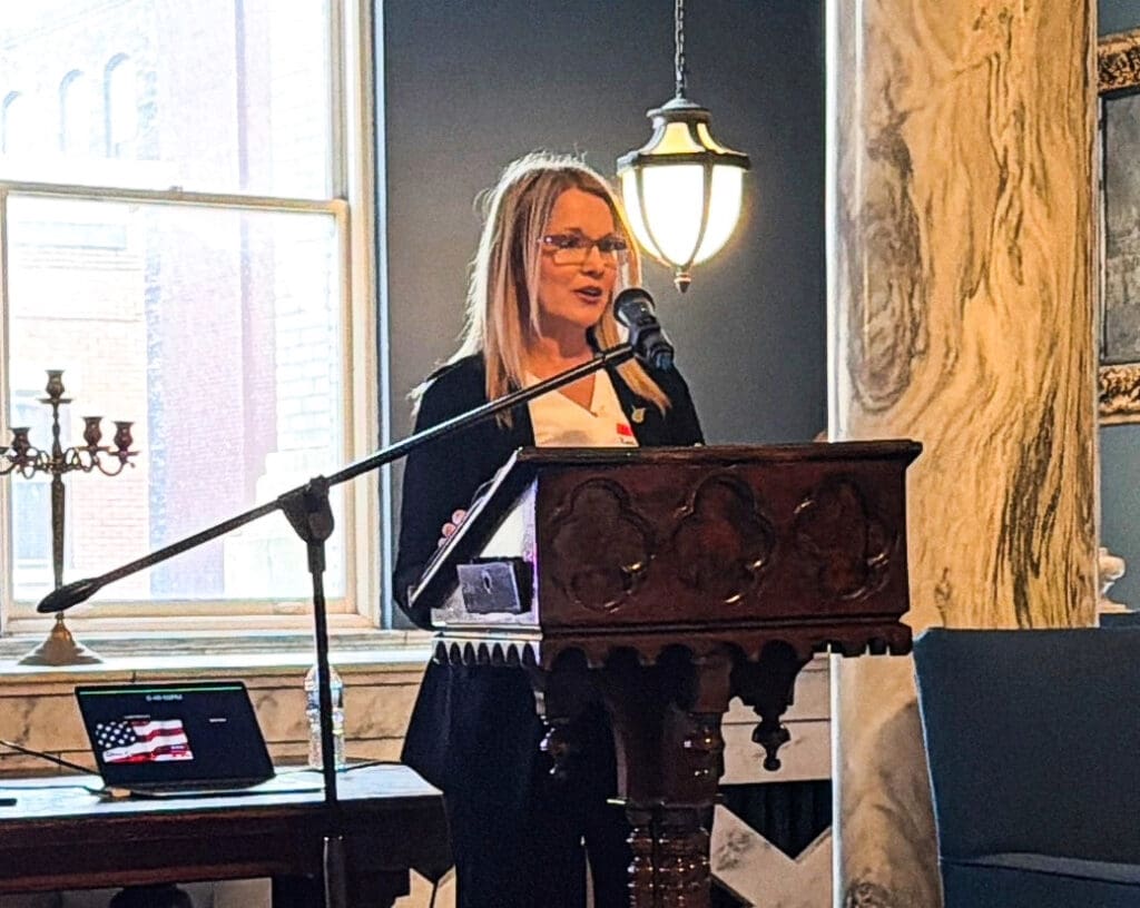 A lady at the podium.