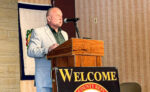 A man at a podium.