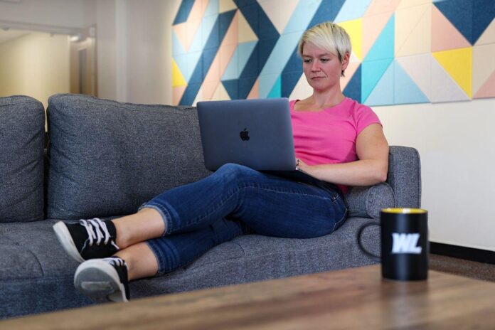 A person on a computer.