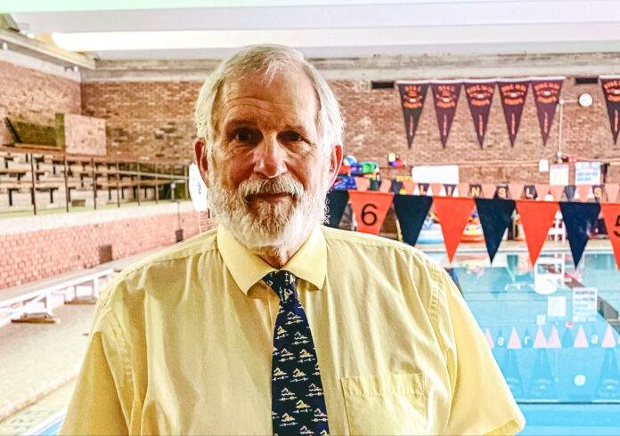 A man near a pool.
