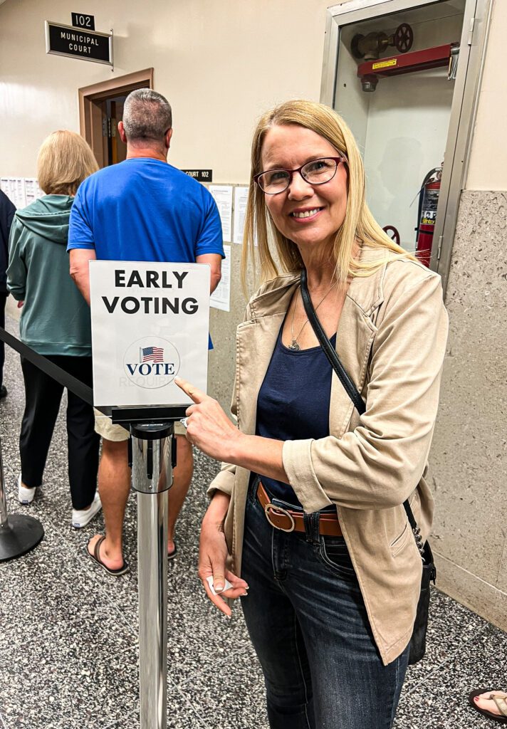 A female at a voting station.