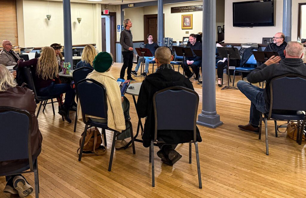 A number of people in a room.