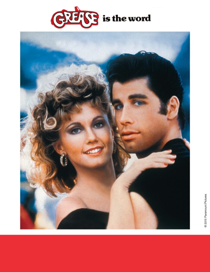 Two people in the movie Grease.