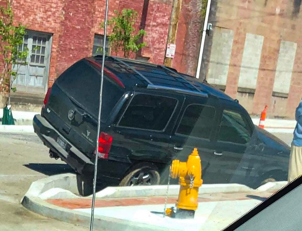 A car in a pit.