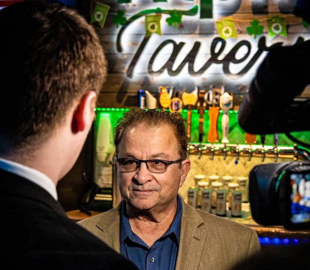 A man being interviewed.