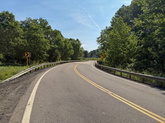 The road is blacktop.