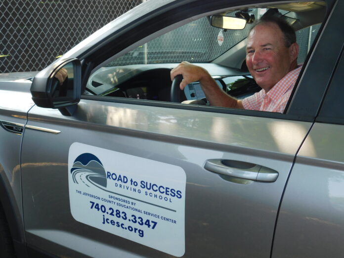 A male behind the wheel.
