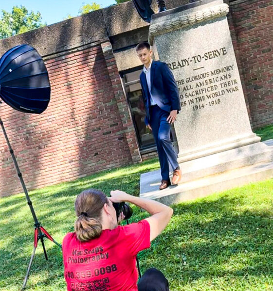 A student and a statue.