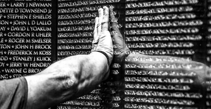 A hand on The Wall.