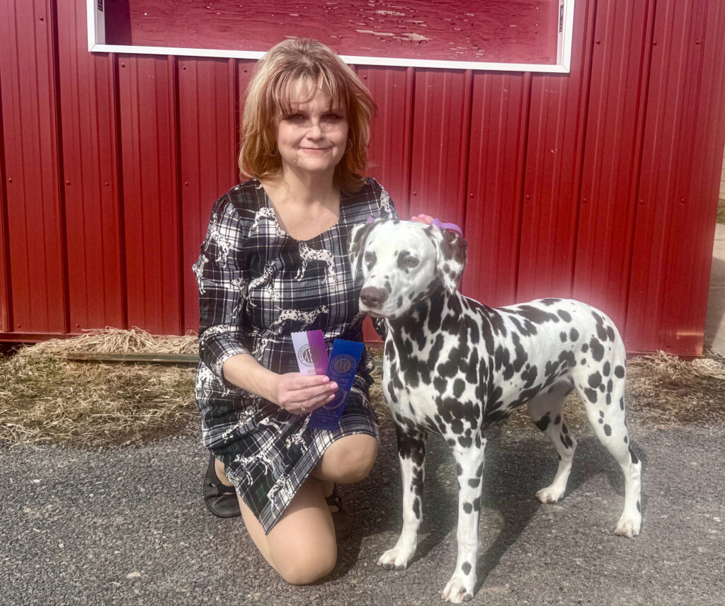 A lady and a dog.