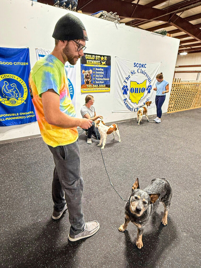 A man with a dog.